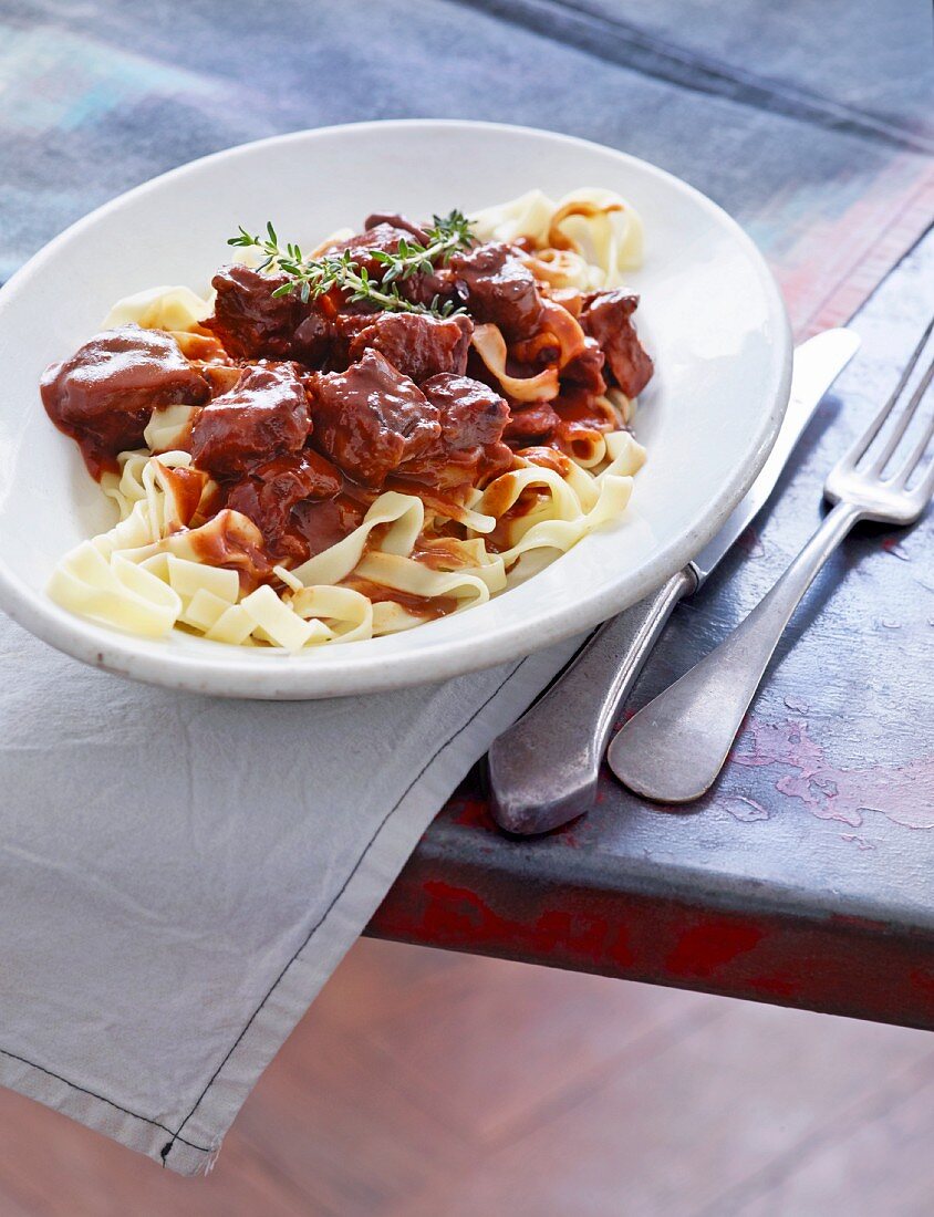 Oxtail ragout with chocolate on a bed of tagliatelle