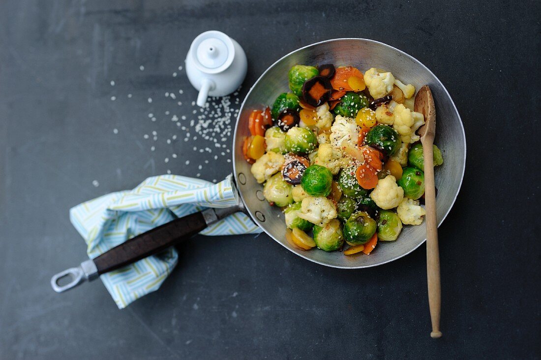 Stir-fried vegetables with Brussels sprouts and sesame seeds