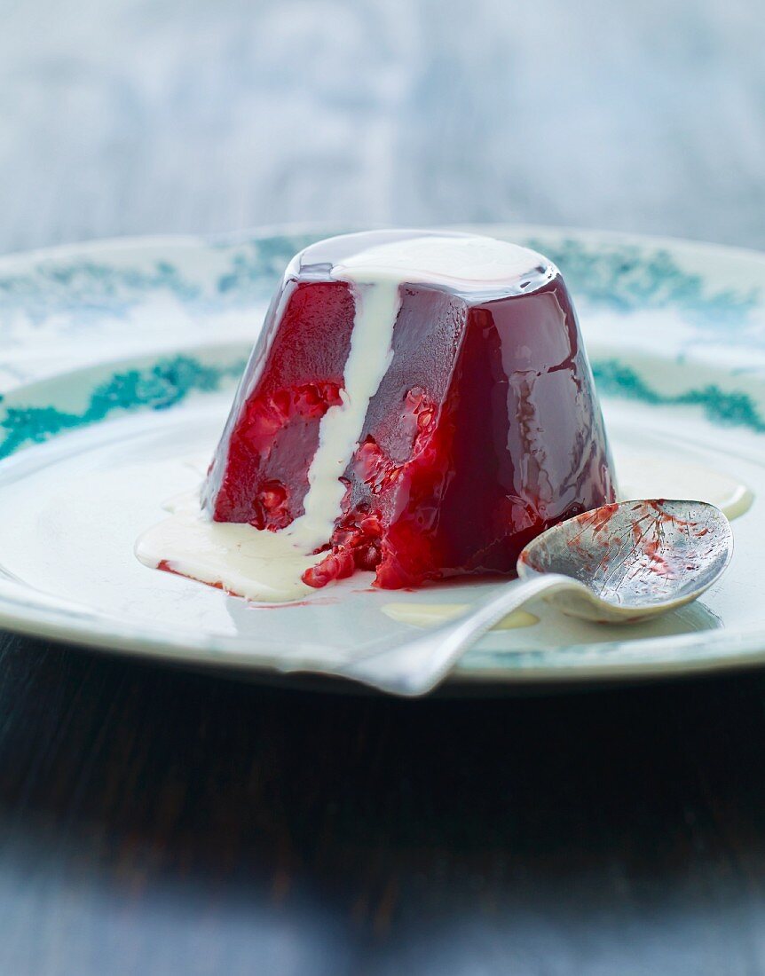Red fruit jelly with vanilla sauce