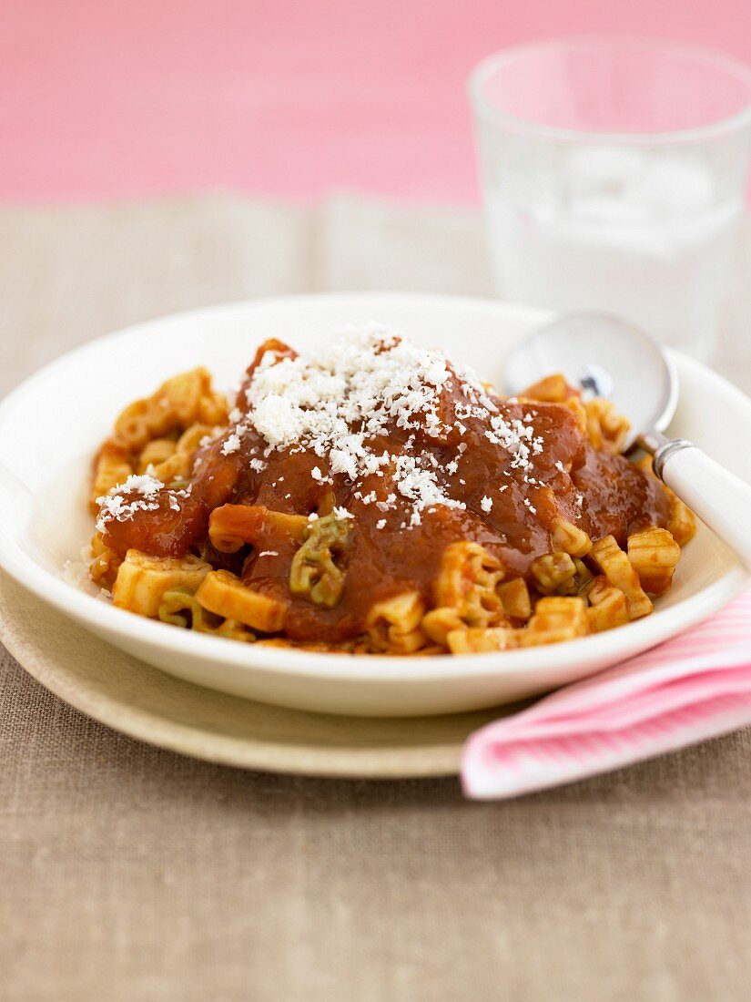 Pasta with a meat sauce and Parmesan cheese