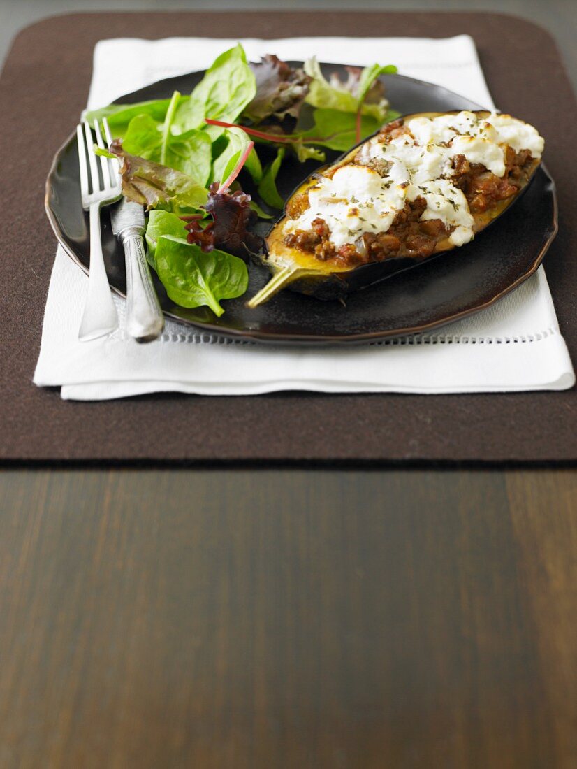 A stuffed aubergine filled with minced lamb, feta and Greek yoghurt