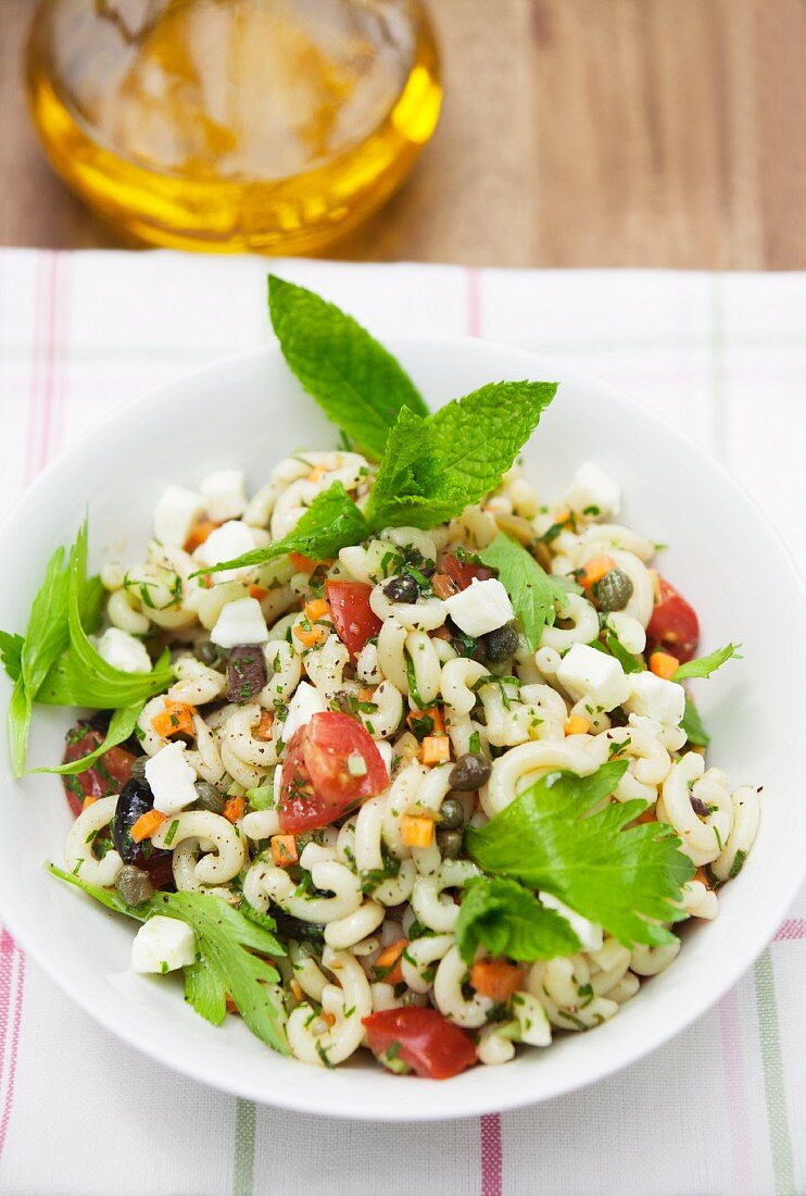 Summer pasta salad with olives and capers
