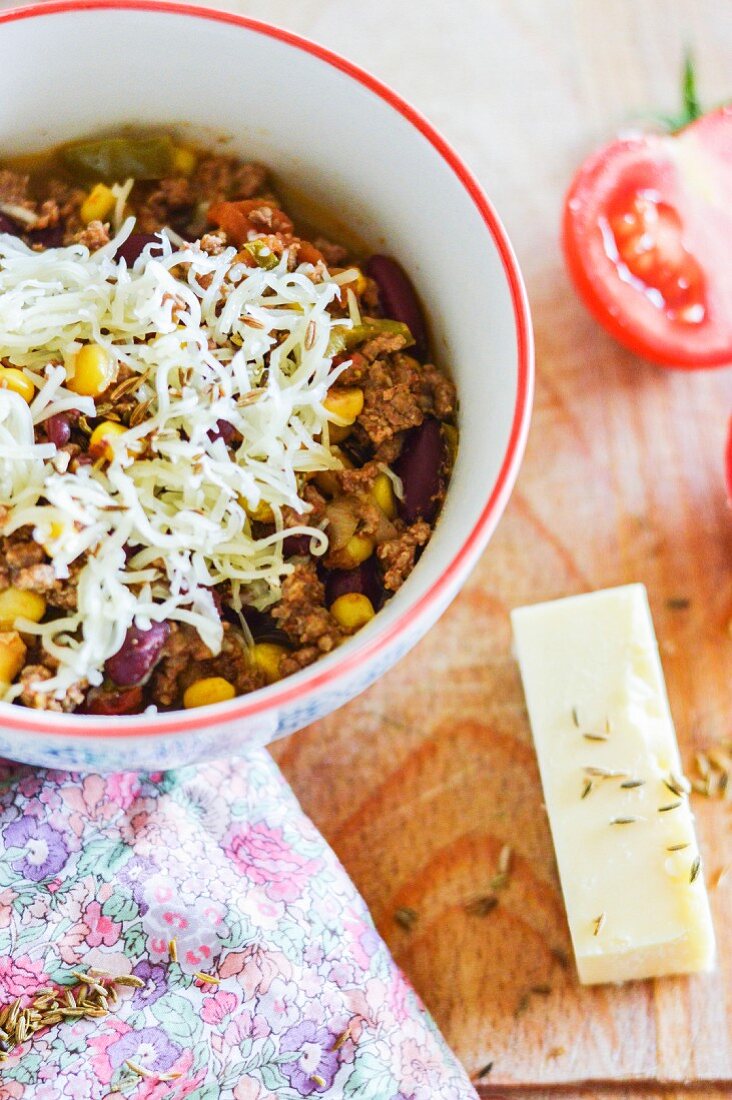 Chilli con carne topped with cheddar cheese