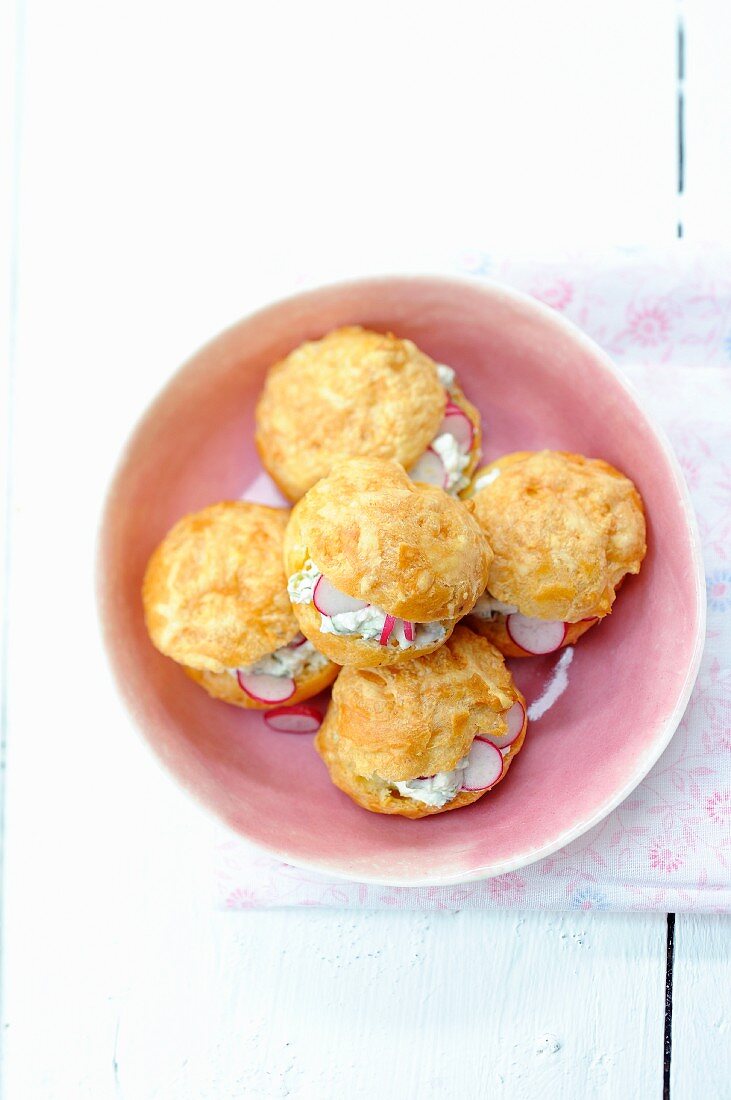 Gougeres with cream cheese and radishes