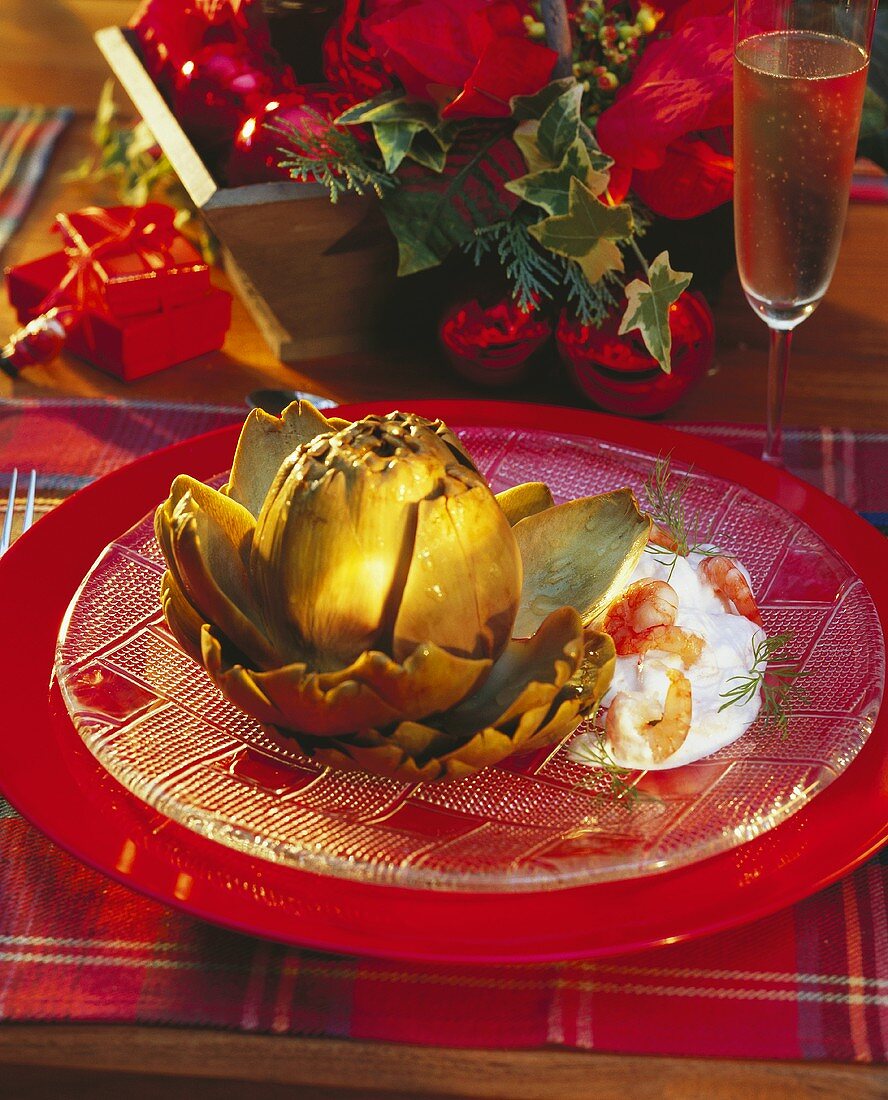 Artichoke with Shrimp Dip on a Plate