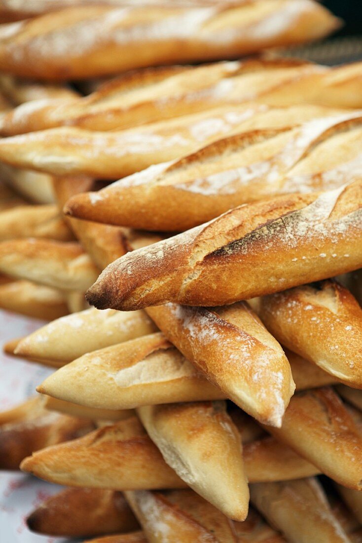 A stack of baguettes at a market in Southern France