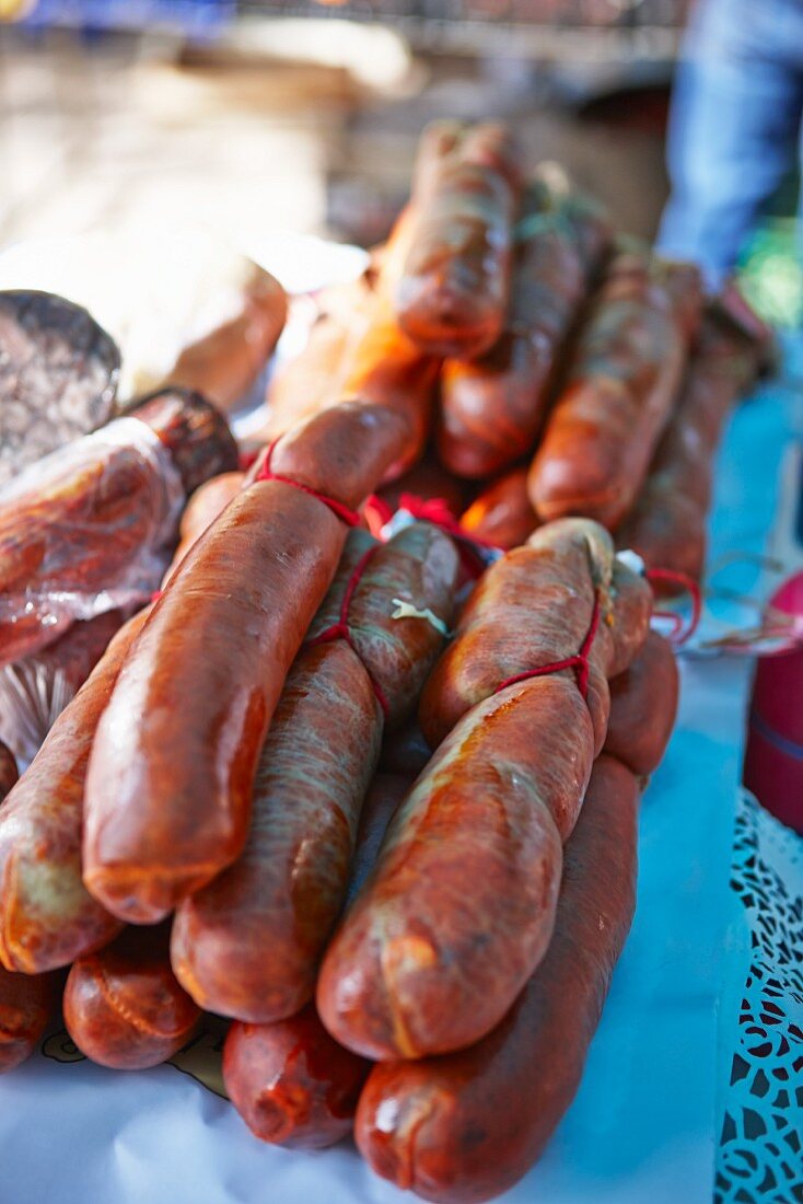 Home-made raw sausages at a market
