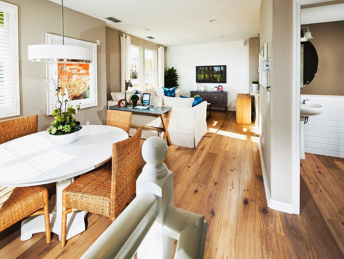 Arranged dining table and living room in open-plan house; Milpitas; California; USA