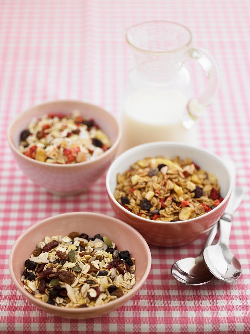 Three different types of muesli in bowls