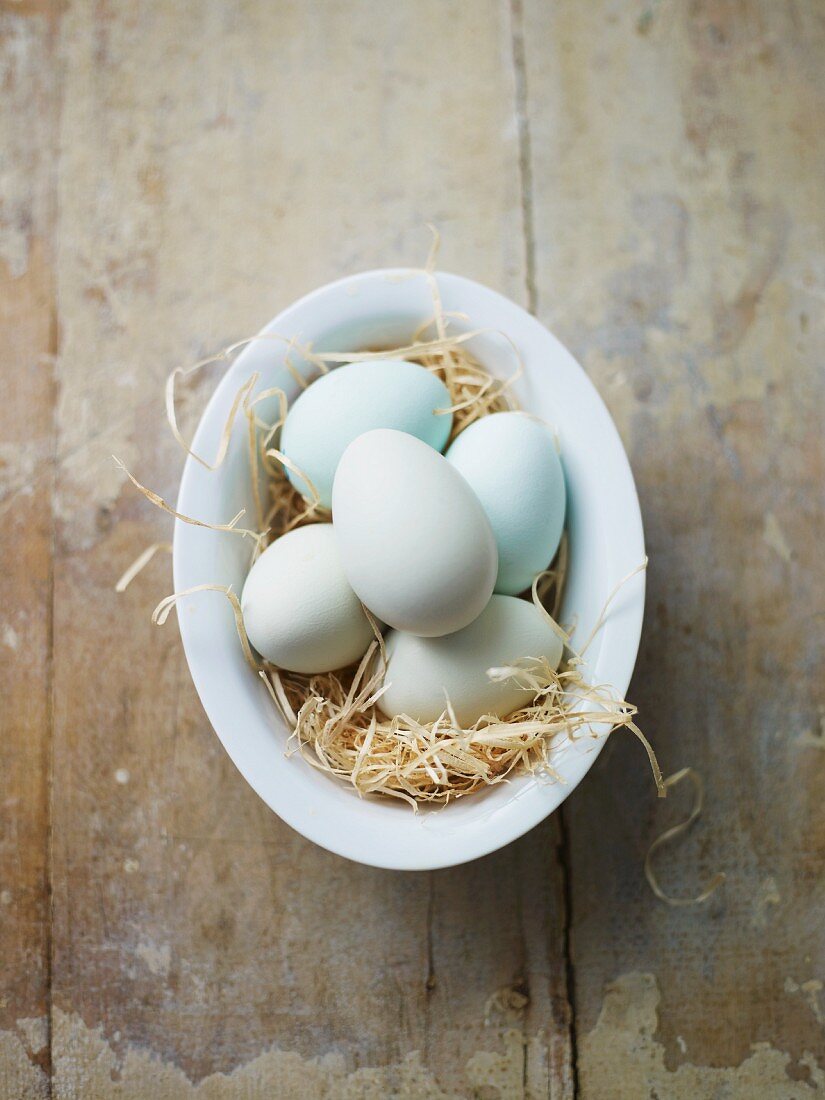 Blue eggs in a bowl