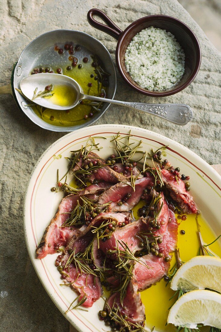 Insalata di manzo (beef salad with pickled peppers, rosemary and lemons, Italy)