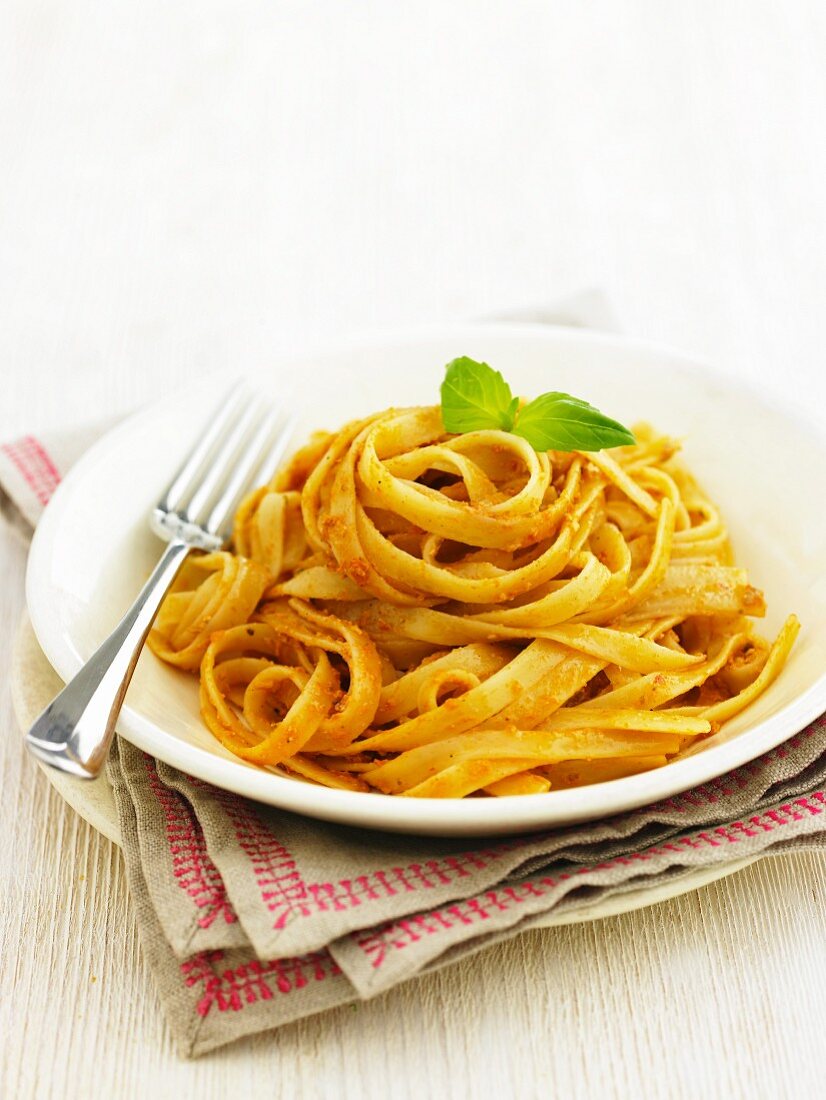 Ribbon pasta with red pesto