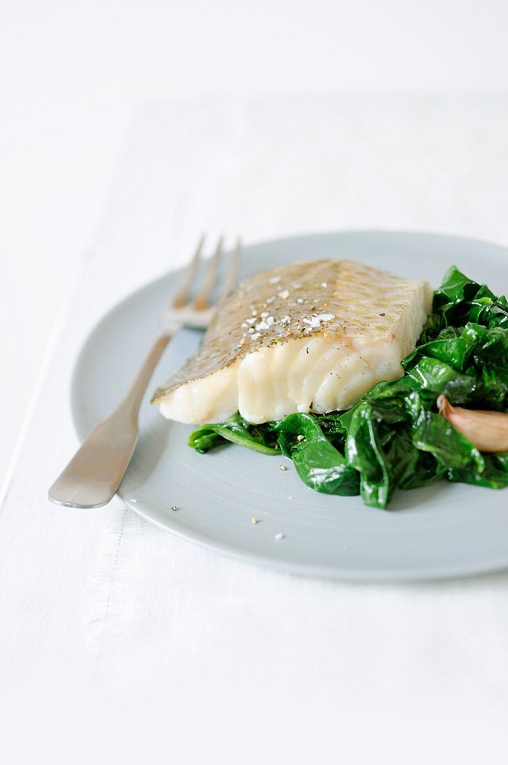 Poached cod with spinach