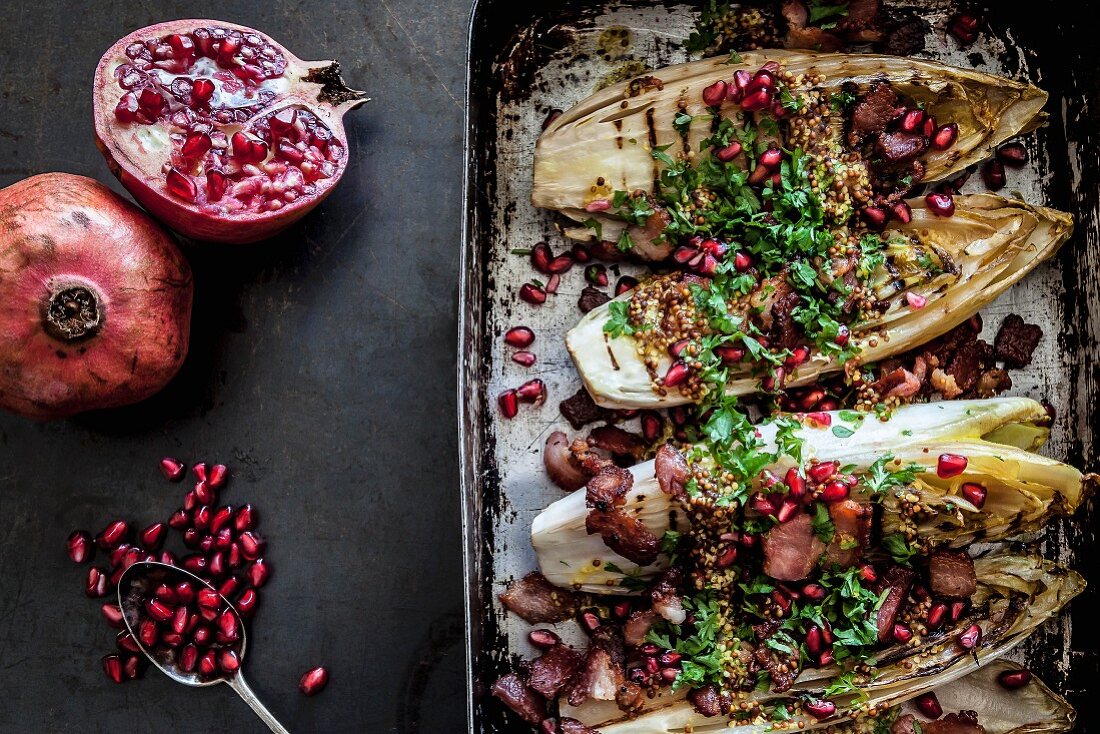 Grilled chicory with pomegranate seeds and Pancetta