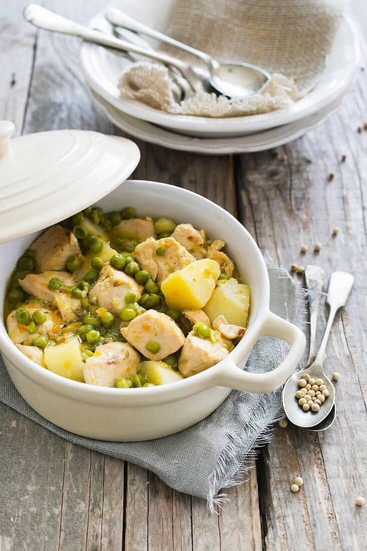 Chicken stew with potatoes and peas