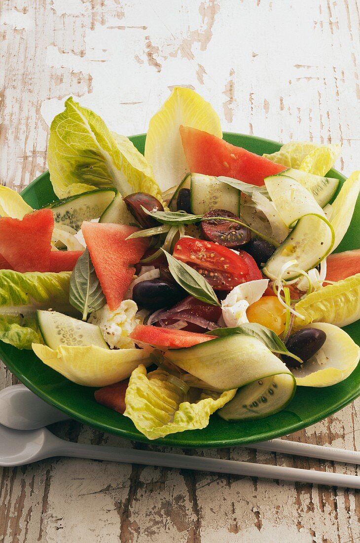 Summer salad with vegetables and watermelon