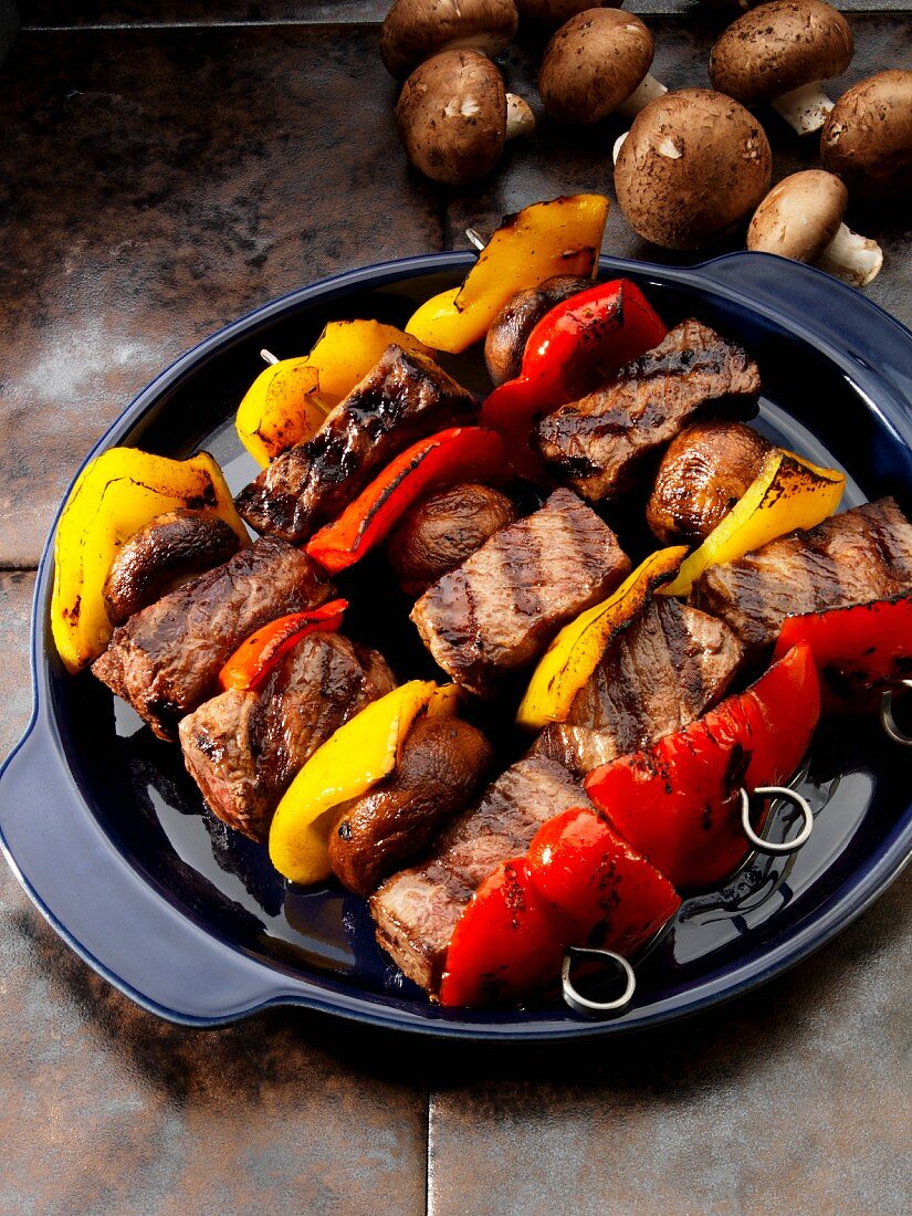 Group skewers with mushrooms and peppers