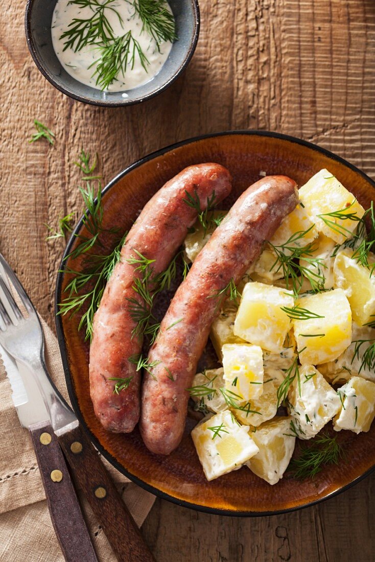 Sausages with potato salad and dill
