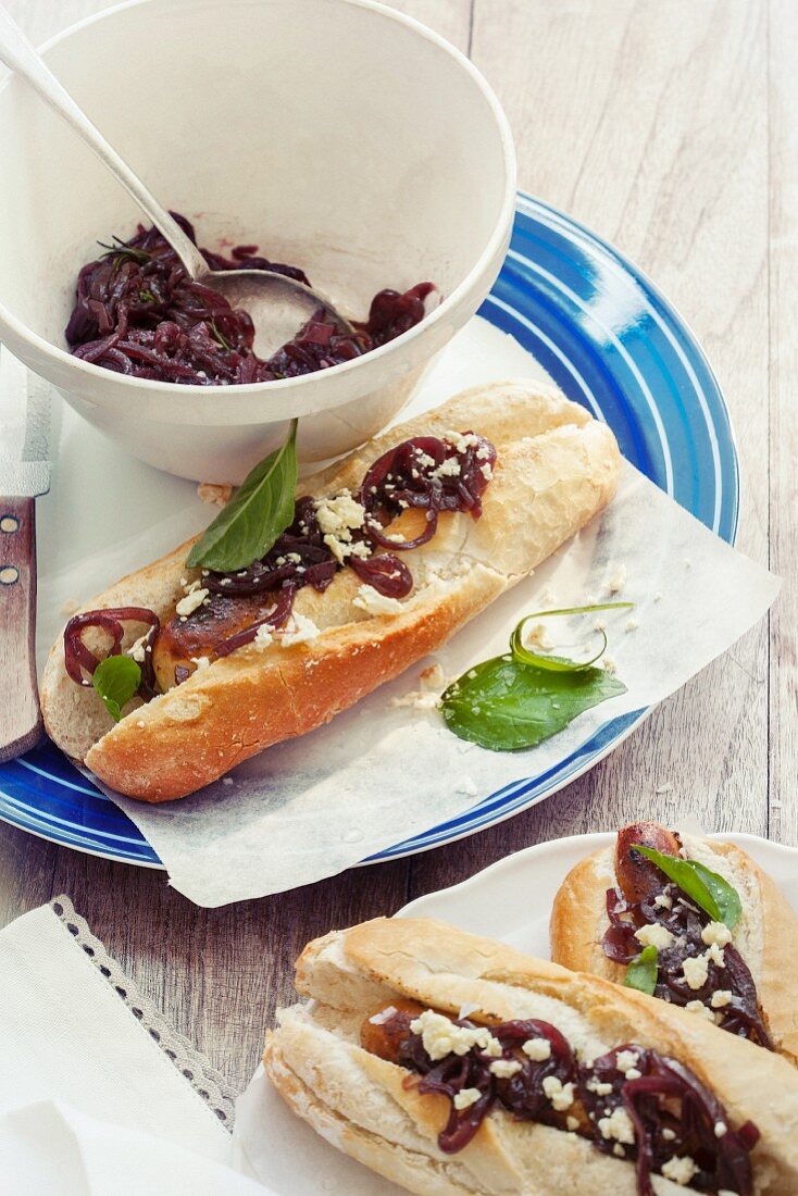 A mini baguette with red wine and onion confit and feta cheese