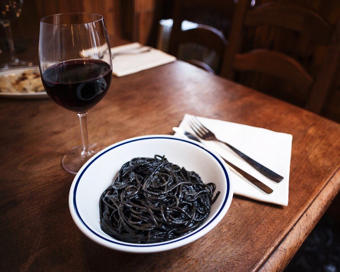 Squid spaghetti in a trattoria in Venice, Italy