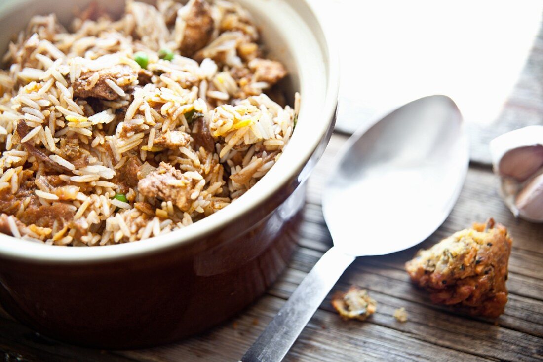 Chicken byriani cooked in a clay pot