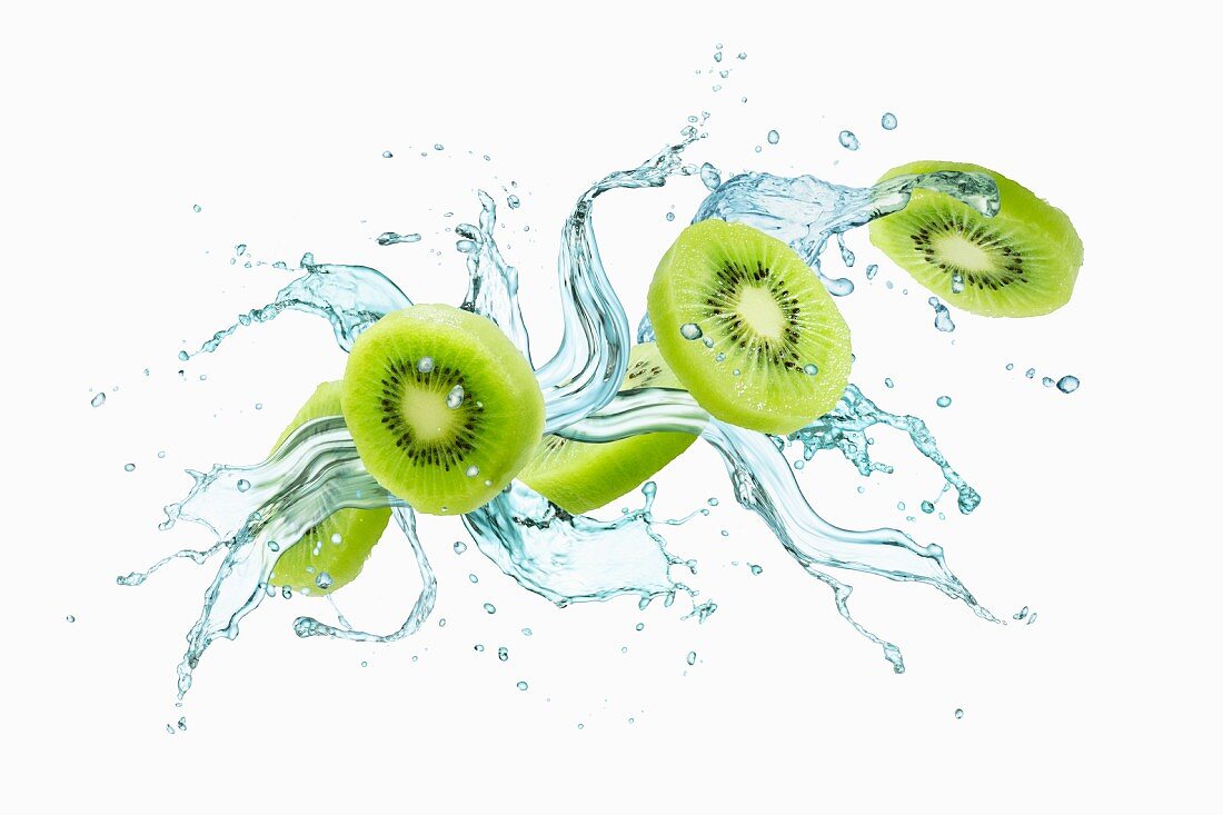 Slices of kiwi with a splash of water