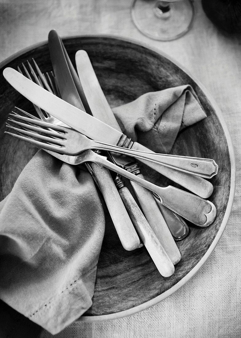 Cutlery and a napkin in a bowl