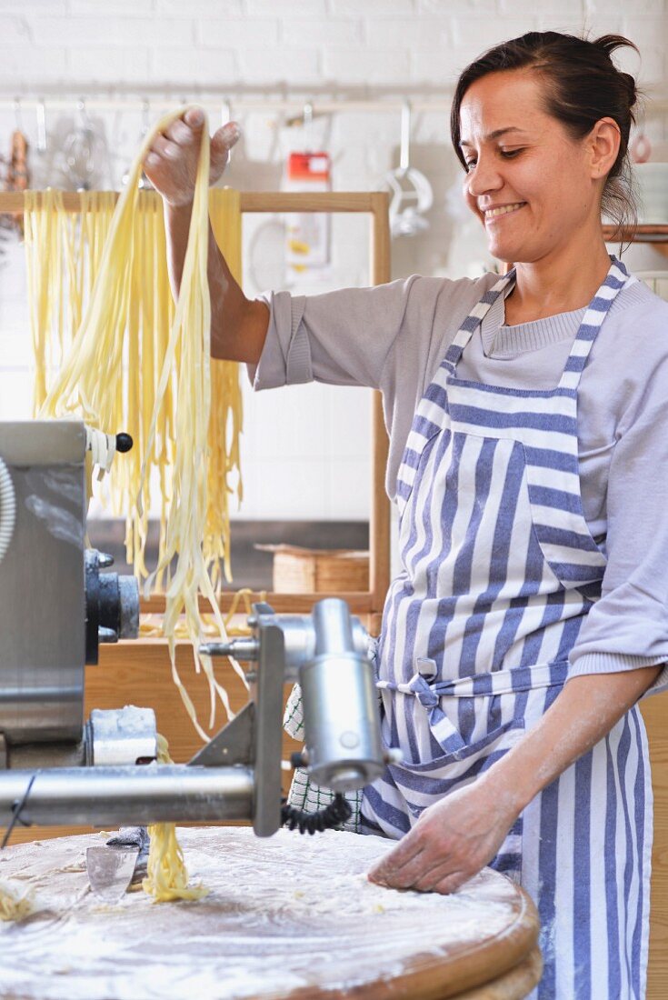 Tagliatelle being hung to dry
