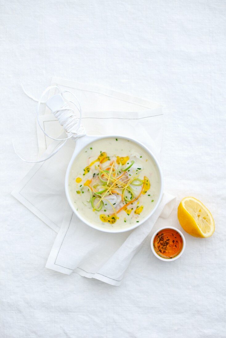 Fish soup with orange and lemon zest