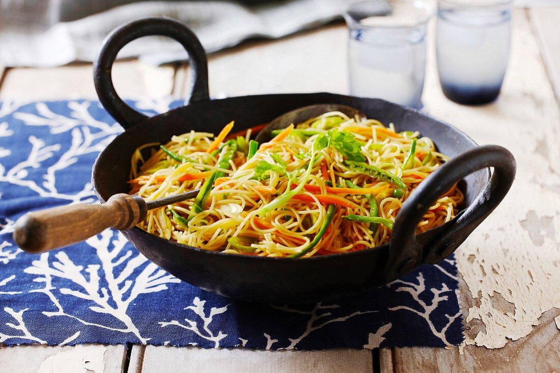Fried rice noodles with vegetables and lemongrass