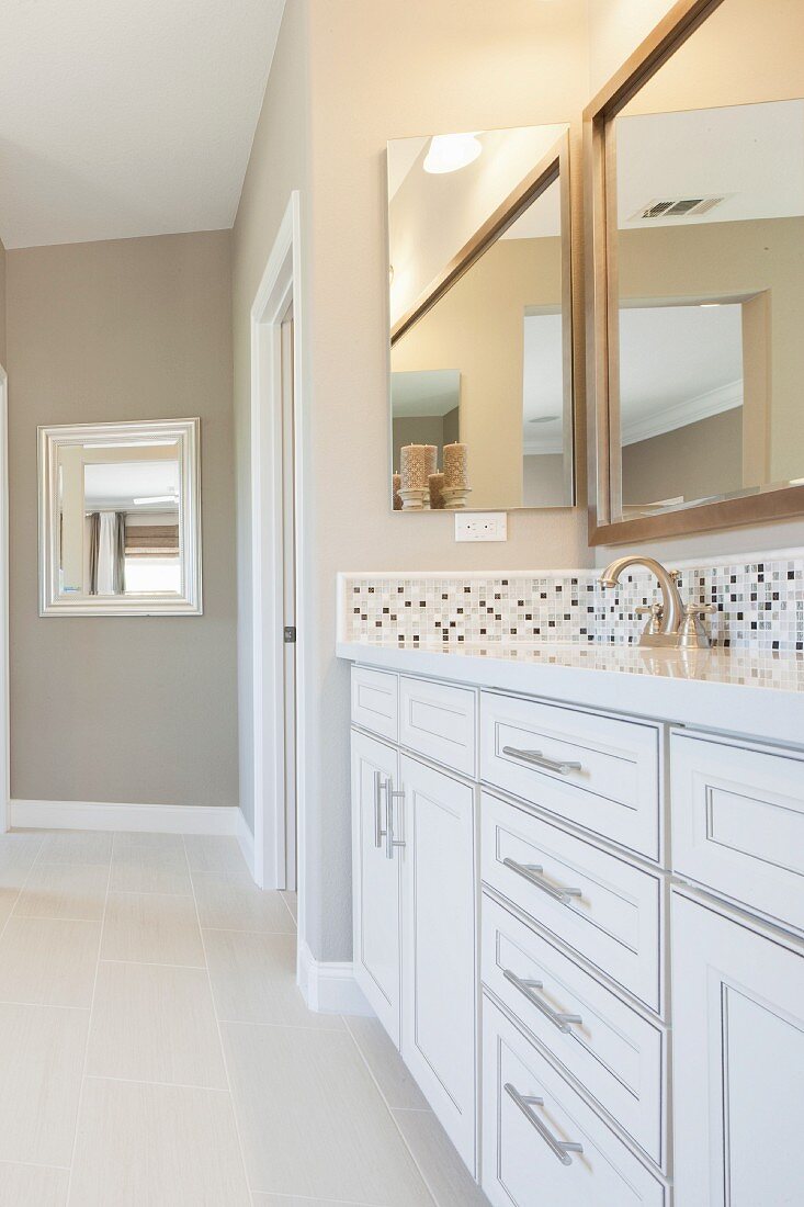 Bathroom with white washstand