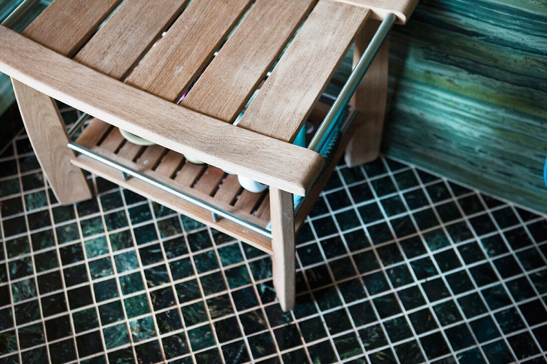High angle close-up of bench on mosaic floor; Laguna Niguel; California; USA