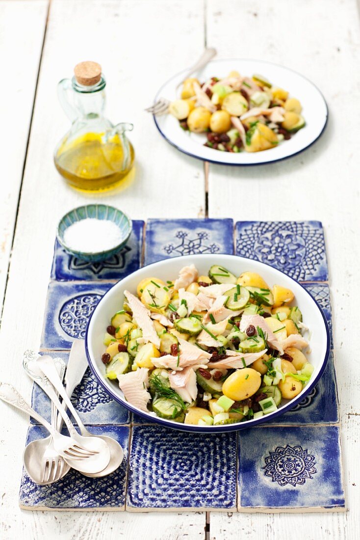 Potato salad with gherkins, raisins and smoked trout
