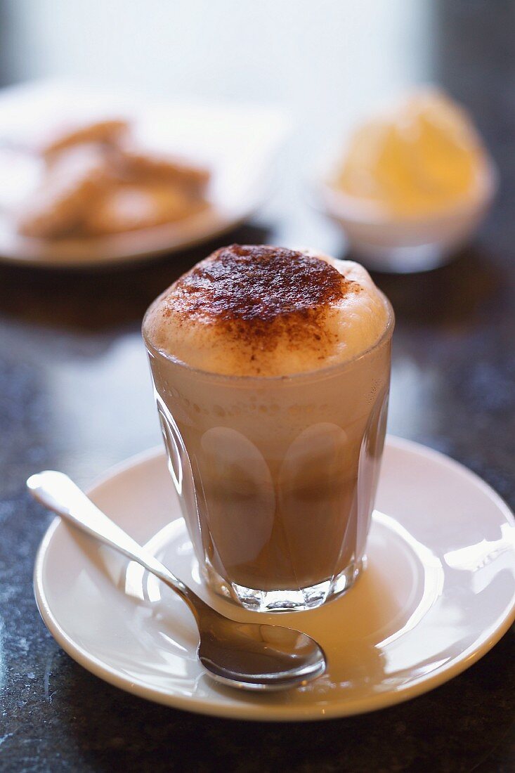 A cappuccino dusted with cocoa powder