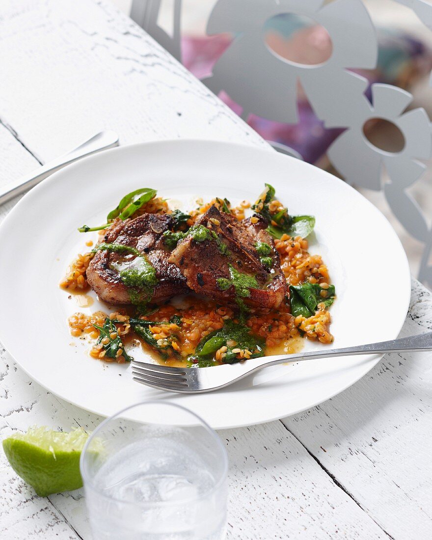 Lamb chops with red lentils and herbs