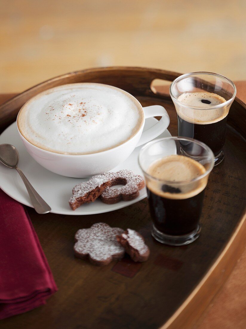 Cappuccino, espresso and biscuits