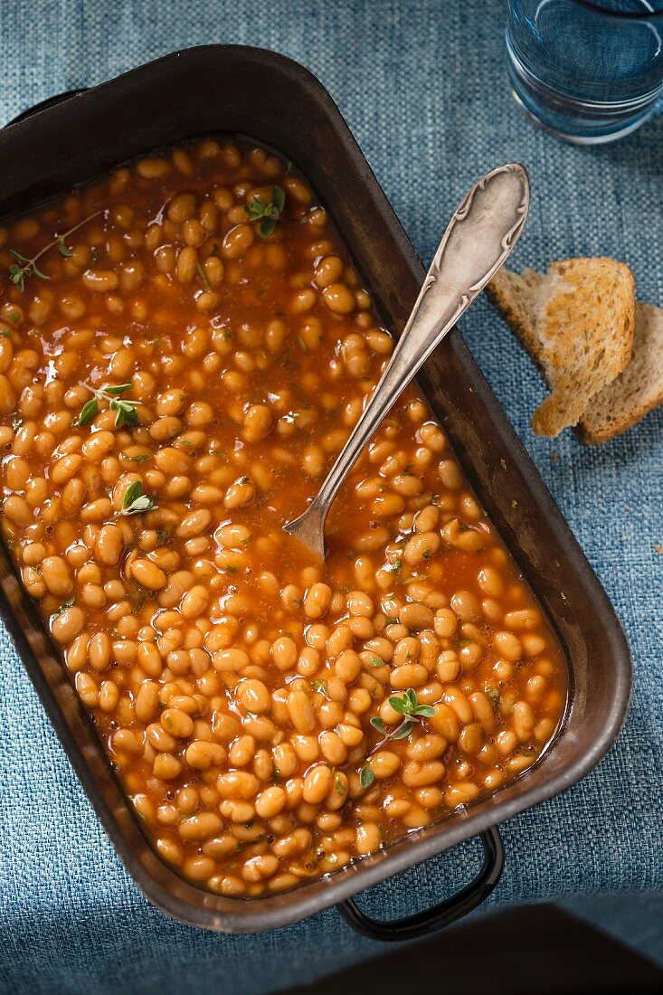 Baked beans in a baking tin