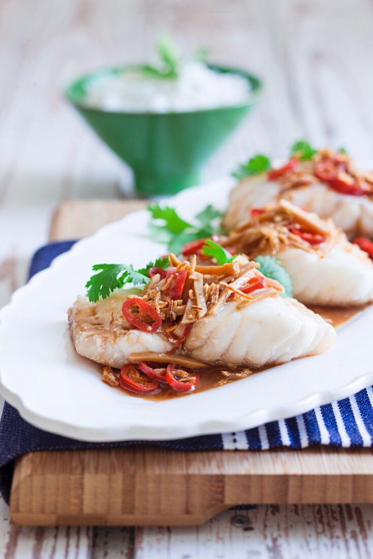 Steamed fish with a ginger and soy sauce and chillis
