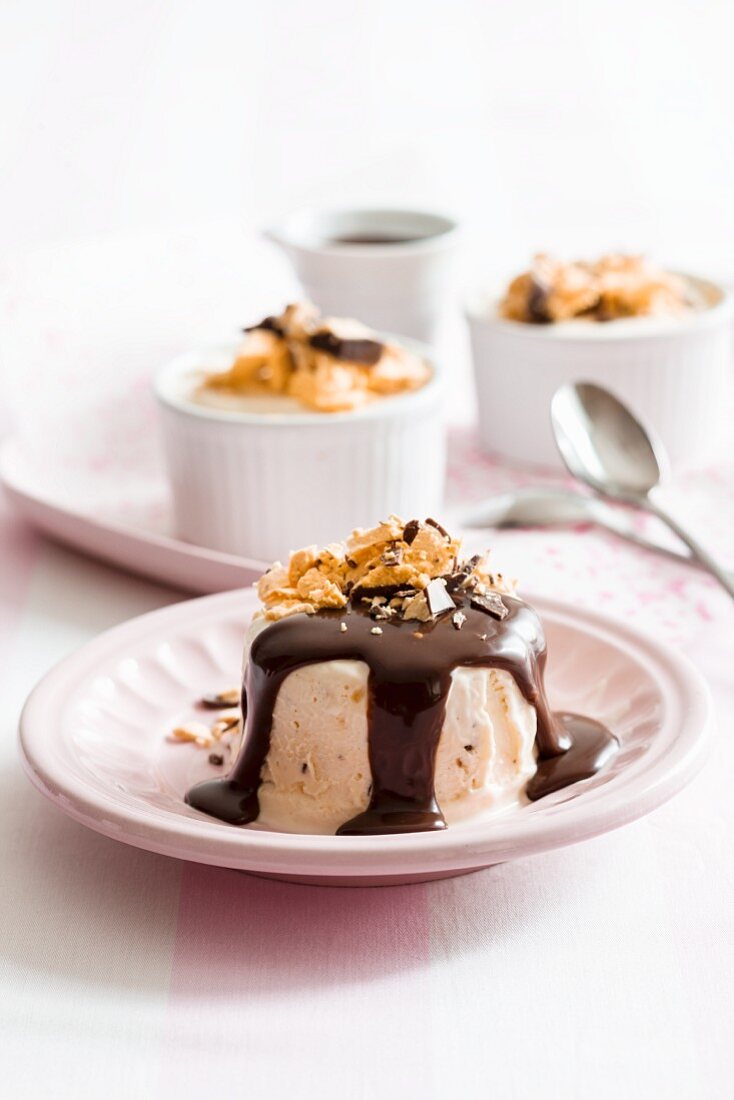 Ice cream parfait with chocolate sauce and honeycomb