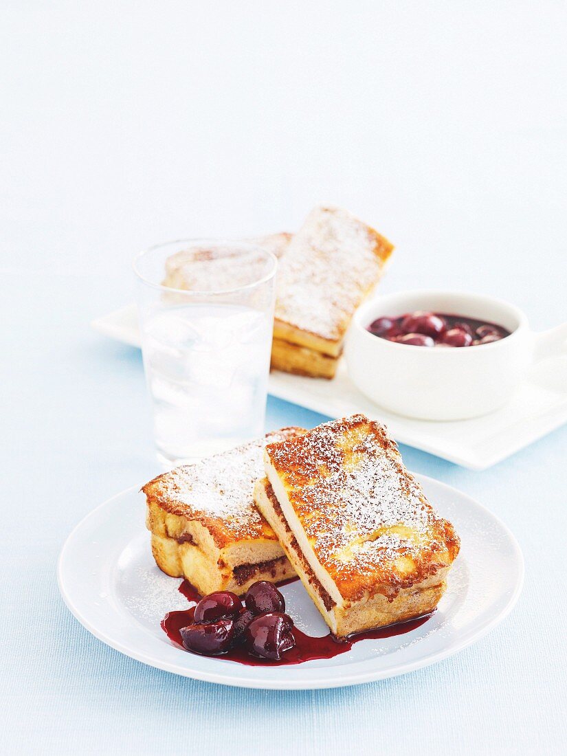 French toast with chocolate and cherry sauce