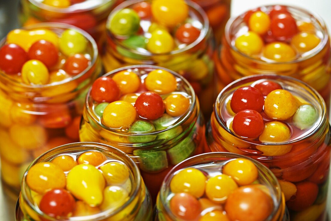 Tomatoes preserved in jars