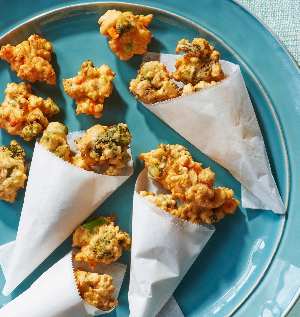 Mini vegetable fritters in paper cones
