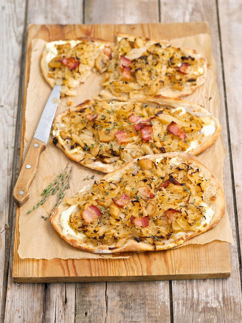 Tarte flambée with white cabbage, onions and Pancetta