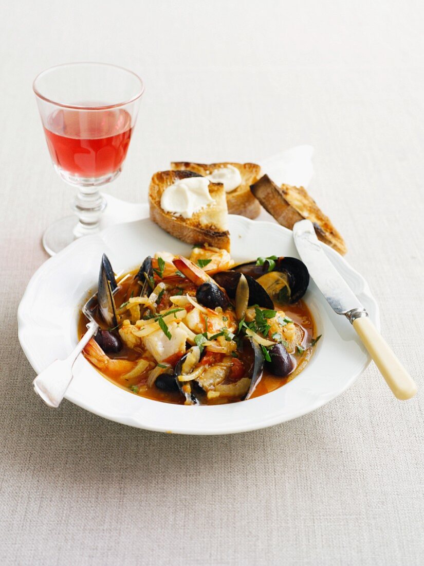 Seafood and fennel stew with grilled bread