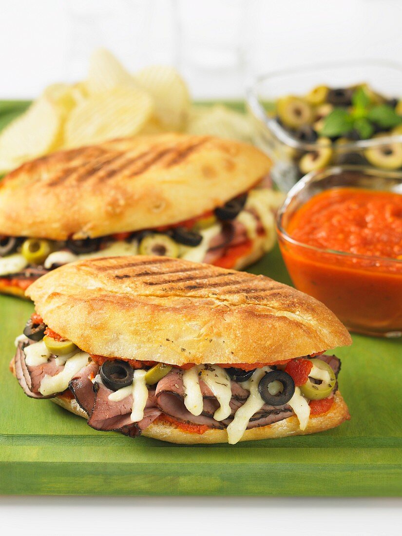 Pizza sandwich with beef and olives