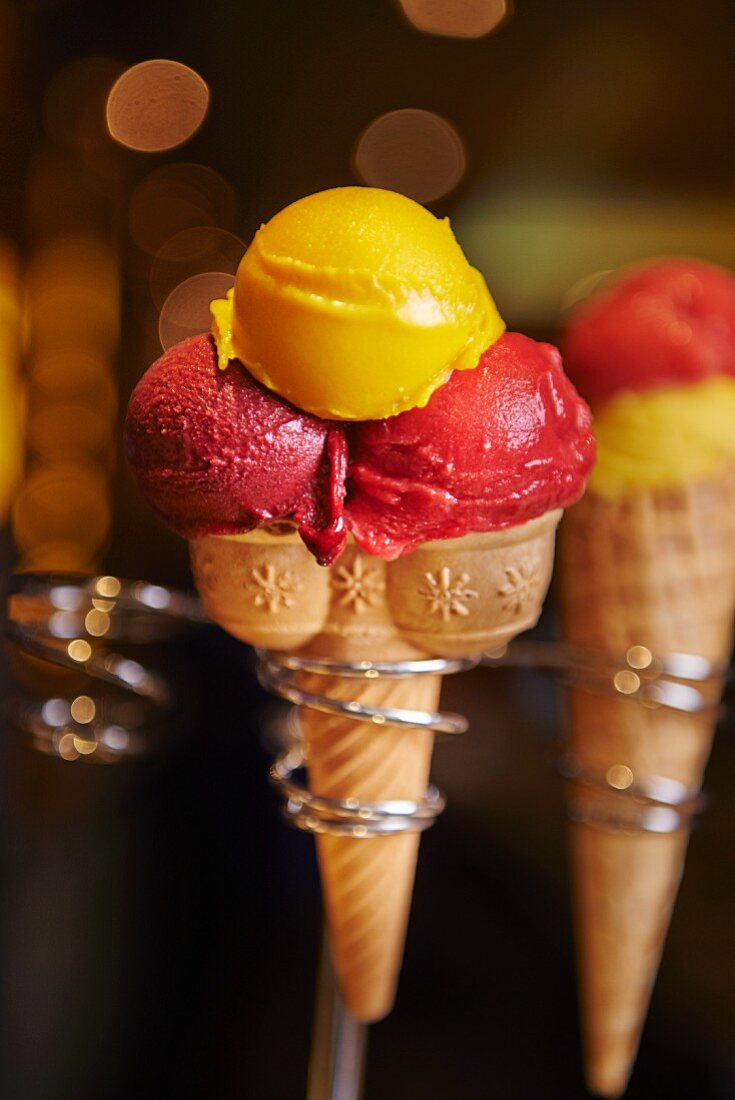 Fruit ice cream in cones in cone holders