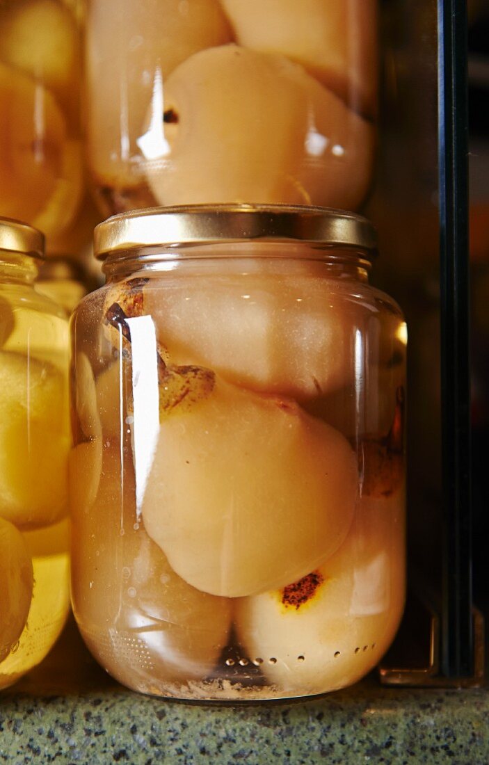 Jars of preserved pears