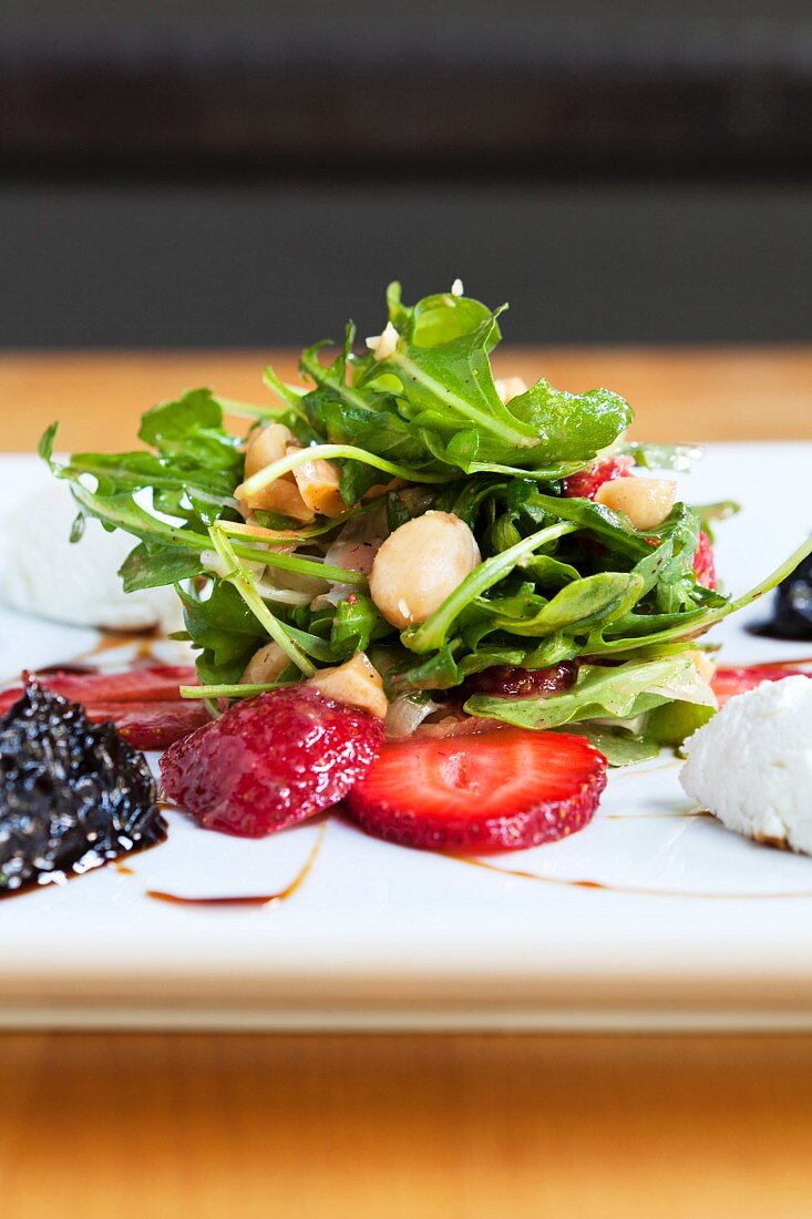 Rocket and strawberry salad with almonds, sherry vinaigrette, goat's cheese and onion chutney