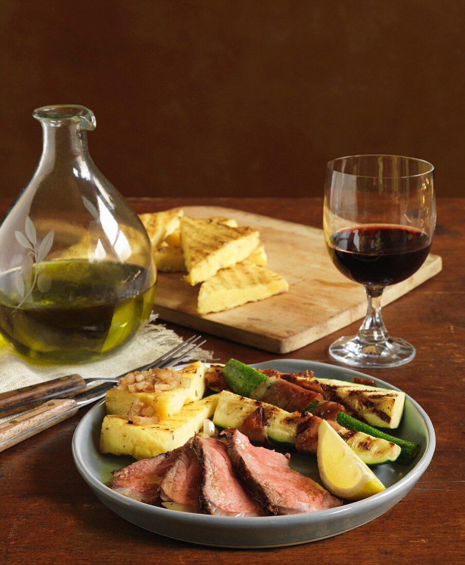 Steak with grilled polenta and grilled vegetables