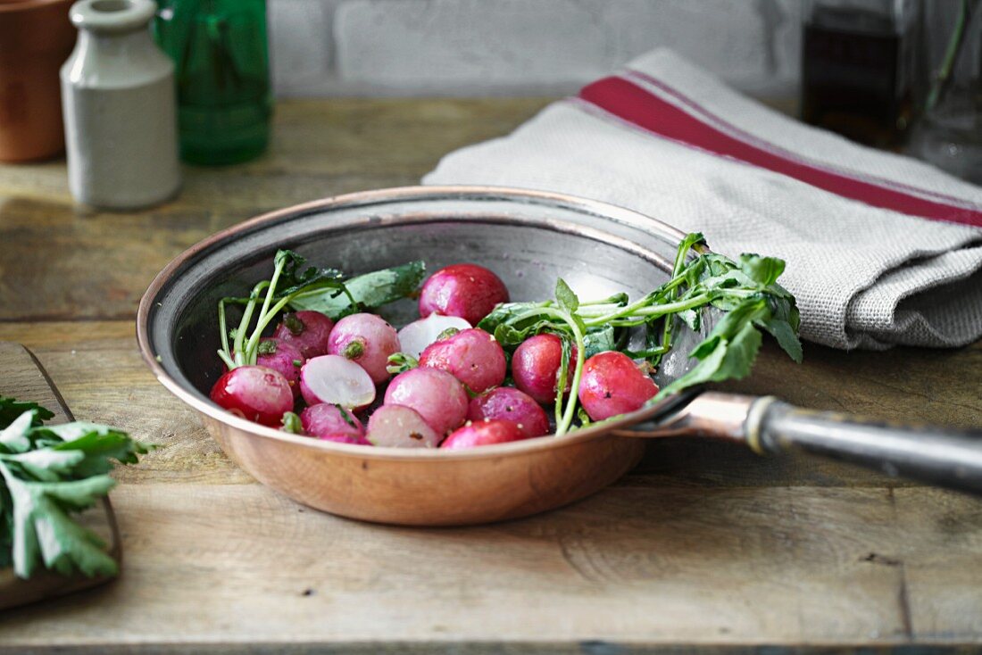 Radishes in pan